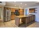 This spacious kitchen features stainless appliances, a large island, and lots of cabinet space at 1410 E Bishop Dr, Tempe, AZ 85282