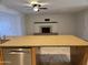 Kitchen island view showcasing the granite countertops and stainless steel dishwasher at 1410 E Bishop Dr, Tempe, AZ 85282