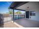 Covered patio overlooks pool with safety fence, perfect for relaxation and outdoor entertaining at 1410 E Bishop Dr, Tempe, AZ 85282