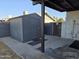 View of backyard shed and patio space at 1410 E Bishop Dr, Tempe, AZ 85282