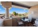 Private balcony with table and chairs, offering scenic views at 14950 W Mountain View Blvd # 4305, Surprise, AZ 85374