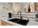 Double kitchen sink with modern faucet at 14950 W Mountain View Blvd # 4305, Surprise, AZ 85374