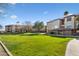 Expansive green lawn area with building views at 14950 W Mountain View Blvd # 4305, Surprise, AZ 85374