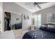 Bright bedroom with mirrored closet doors and window shutters at 15415 S 37Th Pl, Phoenix, AZ 85044