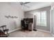 Home office features built-in desk and window shutters at 15415 S 37Th Pl, Phoenix, AZ 85044