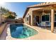 Relaxing pool area with patio furniture and covered patio at 15415 S 37Th Pl, Phoenix, AZ 85044