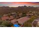 Aerial view of a house with a pool and mountain views at 15859 N Nyack Dr, Fountain Hills, AZ 85268