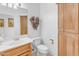 Clean bathroom with light wood cabinets and a white vanity at 15859 N Nyack Dr, Fountain Hills, AZ 85268