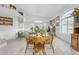 Bright dining area with wood table and access to living room at 15859 N Nyack Dr, Fountain Hills, AZ 85268