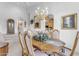 Elegant dining room with a wood table and view to kitchen at 15859 N Nyack Dr, Fountain Hills, AZ 85268