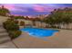 Inviting kidney shaped pool with a surrounding patio at 15859 N Nyack Dr, Fountain Hills, AZ 85268