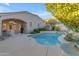 Inviting kidney-shaped pool with surrounding patio at 15859 N Nyack Dr, Fountain Hills, AZ 85268