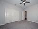 Spacious bedroom with ceiling fan and ample closet space at 16871 W Cielo Grande Ave, Surprise, AZ 85387