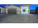 Spacious 3-car garage with extended workshop area at 16871 W Cielo Grande Ave, Surprise, AZ 85387