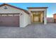 3-car garage with an extended workshop area, and modern lighting at 16871 W Cielo Grande Ave, Surprise, AZ 85387