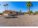 Spacious backyard with gravel landscaping and desert plants at 18014 N Broken Bow Ct, Sun City, AZ 85373