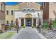 Elegant community center entrance with landscaping at 18055 W Muirwood Dr, Goodyear, AZ 85338