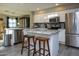 Modern kitchen with white cabinets, granite counters, and island at 1860 S 24Th St, Mesa, AZ 85204