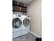 Laundry room with front-load washer and dryer at 1860 S 24Th St, Mesa, AZ 85204