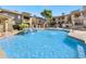 Inviting community pool with water feature at 1880 E Morten Ave # 206, Phoenix, AZ 85020