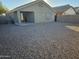 Large backyard with gravel and a covered patio at 19002 N Toledo Ave, Maricopa, AZ 85138