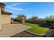 Brick paved patio and artificial turf backyard at 19137 W Jackson St, Buckeye, AZ 85326