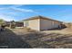 Landscaped backyard with gravel and playground at 19137 W Jackson St, Buckeye, AZ 85326