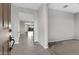 View down the entry hall into the living room area at 19137 W Jackson St, Buckeye, AZ 85326