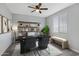 Home office featuring a large desk and modern shelving at 19137 W Jackson St, Buckeye, AZ 85326