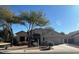 One-story house with a two-car garage and mature landscaping at 20457 N 80Th Dr, Peoria, AZ 85382