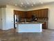 Spacious kitchen with granite countertops and island at 20457 N 80Th Dr, Peoria, AZ 85382