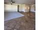 Spacious living room with tile and carpet flooring, ceiling fan at 20457 N 80Th Dr, Peoria, AZ 85382