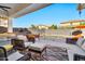 Outdoor oasis with a sparkling pool and patio furniture at 21002 E Mayberry Rd, Queen Creek, AZ 85142