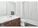 Clean bathroom with a modern vanity and shower/tub combo at 21002 E Mayberry Rd, Queen Creek, AZ 85142