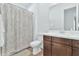 Clean bathroom with shower/tub combo and updated vanity at 21002 E Mayberry Rd, Queen Creek, AZ 85142