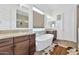 Luxurious bathroom with double vanity and a freestanding tub at 21002 E Mayberry Rd, Queen Creek, AZ 85142