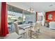 Modern dining area with glass table and patio access at 21002 E Mayberry Rd, Queen Creek, AZ 85142