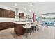 Modern kitchen with island, stainless steel appliances, and white cabinets at 21002 E Mayberry Rd, Queen Creek, AZ 85142