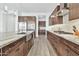 Modern kitchen with stainless steel appliances and white cabinets at 21002 E Mayberry Rd, Queen Creek, AZ 85142