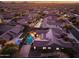 Aerial view showcasing the home's layout, pool, and surrounding neighborhood at 2207 W Hidden Treasure Way, Phoenix, AZ 85086