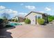 Spacious backyard with a large pool and patio area at 2207 W Hidden Treasure Way, Phoenix, AZ 85086