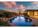 Stunning pool with rock waterfall feature, ideal for relaxation and recreation at 2207 W Hidden Treasure Way, Phoenix, AZ 85086