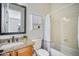 Bathroom with tub, shower, and granite vanity at 2207 W Hidden Treasure Way, Phoenix, AZ 85086