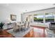 Elegant dining room with hardwood floors and large windows at 2207 W Hidden Treasure Way, Phoenix, AZ 85086