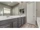 Double vanity bathroom with modern gray cabinets at 22643 E Stonecrest Dr, Queen Creek, AZ 85142