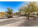 Relaxing community park with a picnic table and native desert landscaping at 22643 E Stonecrest Dr, Queen Creek, AZ 85142