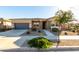 Single-story home with attached garage and desert landscaping at 22643 E Stonecrest Dr, Queen Creek, AZ 85142