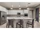 Modern kitchen with white cabinets and granite countertops at 22643 E Stonecrest Dr, Queen Creek, AZ 85142