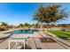 Community pool with plenty of seating at 22643 E Stonecrest Dr, Queen Creek, AZ 85142