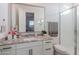 Bathroom with single vanity, shower, and granite countertop at 2408 N Morrison Ave, Casa Grande, AZ 85122